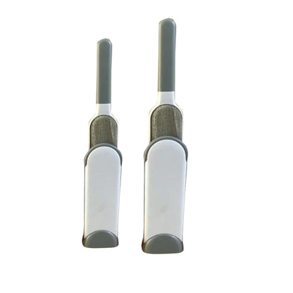 Two white and gray pet grooming brushes on a white background