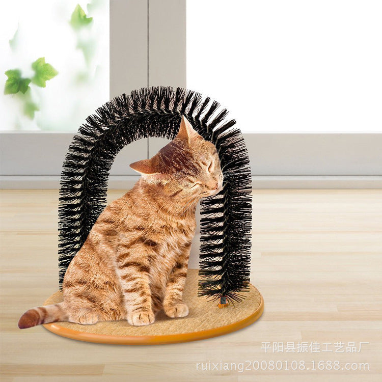 Cat using a self-grooming arch toy on a wooden surface.