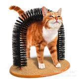 Cat using a self-grooming brush with a white background
