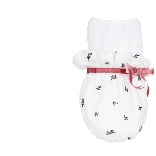 White baby romper with floral patterns and a pink ribbon on a white background
