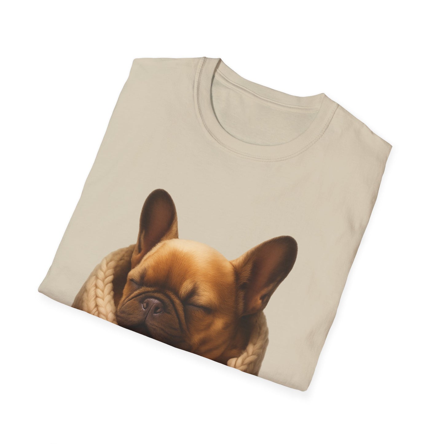 Folded beige t-shirt with a dog design on a white background