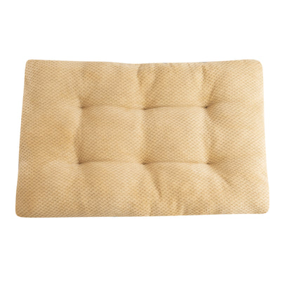 Beige cushion with a textured surface on a white background
