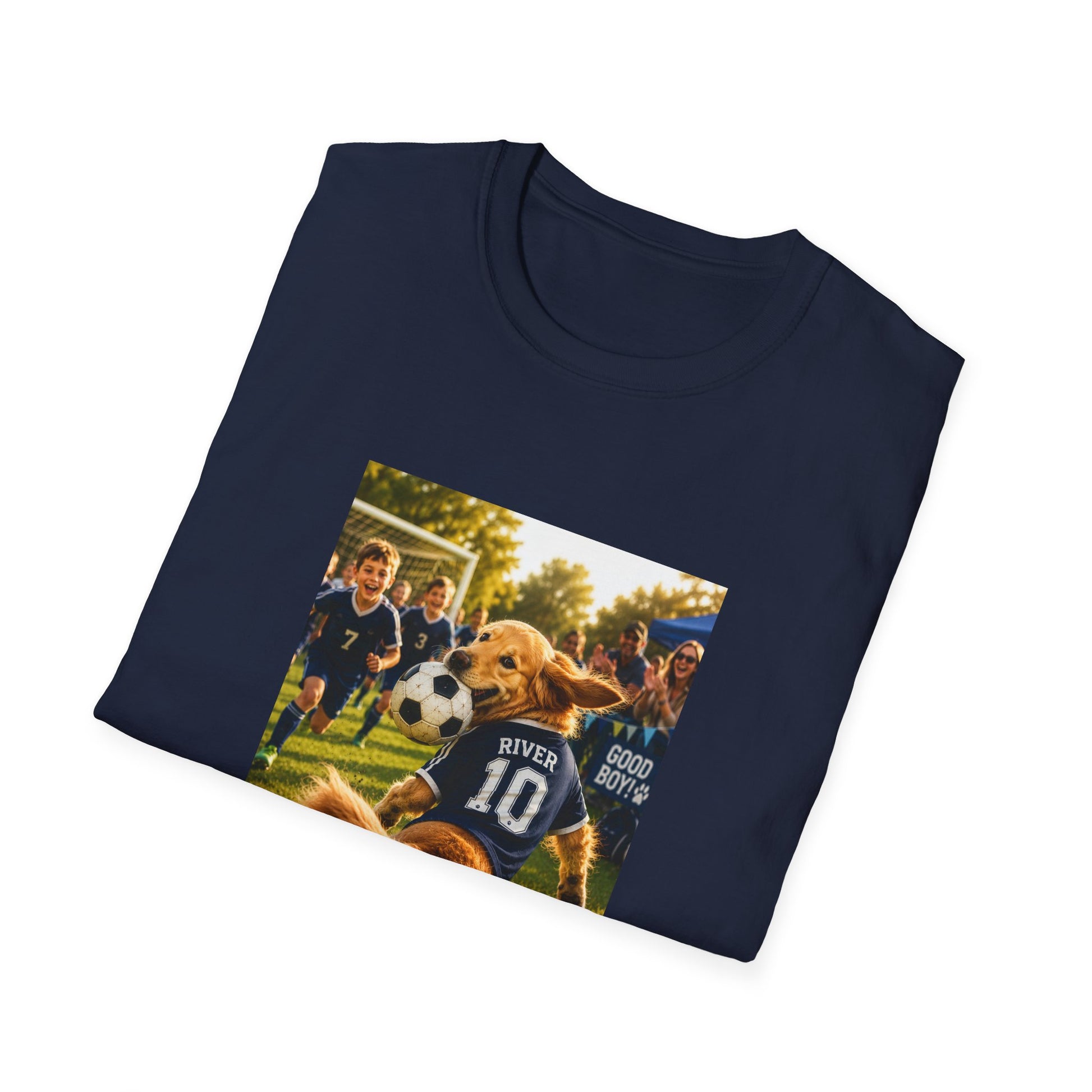 A navy blue folded t-shirt with a custom graphic print of a golden retriever dog wearing a soccer jersey and playing with a soccer ball on a field, shown on a plain white background.