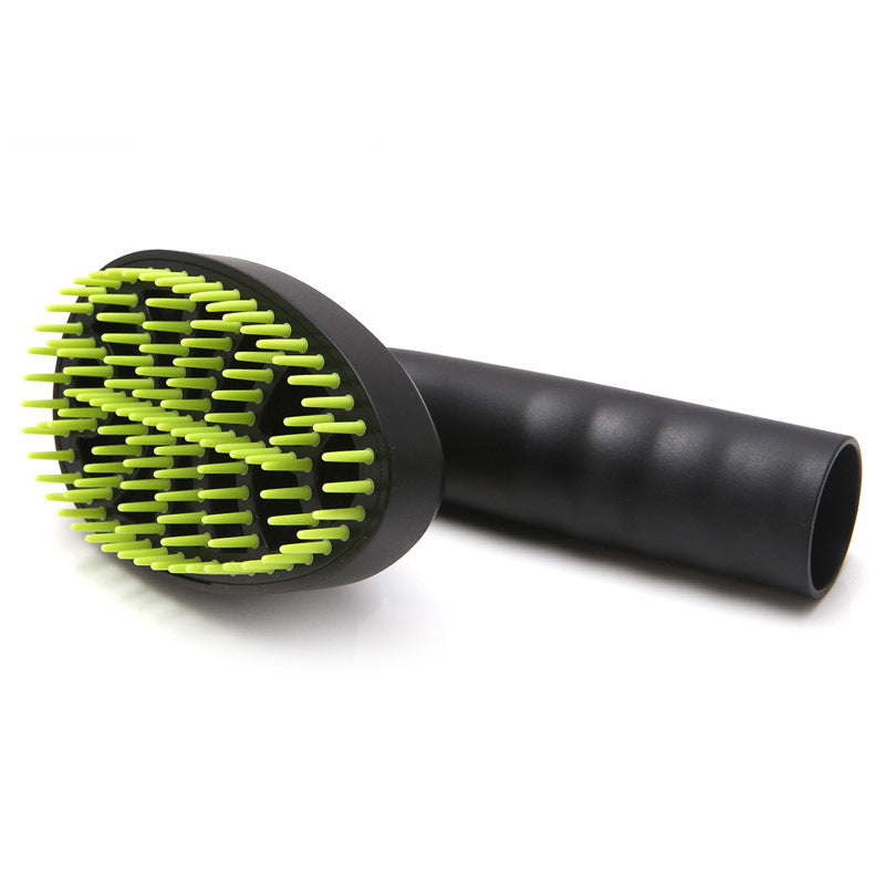 Pet grooming brush with green bristles and black handle on a white background