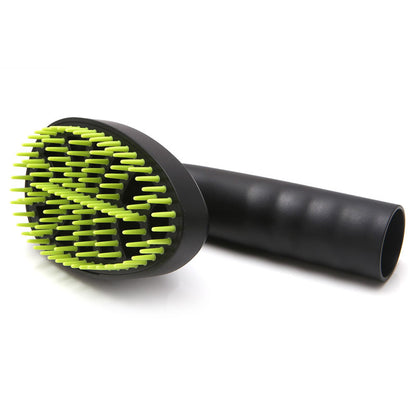 Pet grooming brush with green bristles and black handle on a white background