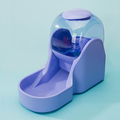 Purple pet feeder with transparent top on a light blue background