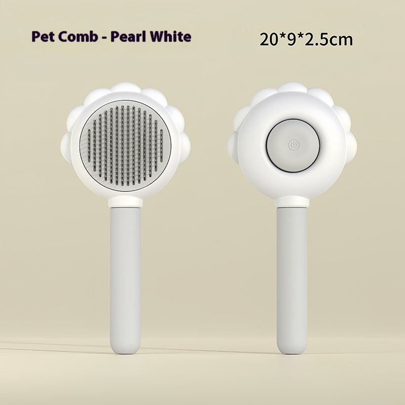 Pet comb with white handle and pearl white head on beige background