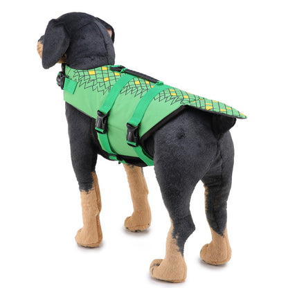 Dog wearing a green life jacket with a pattern on a white background