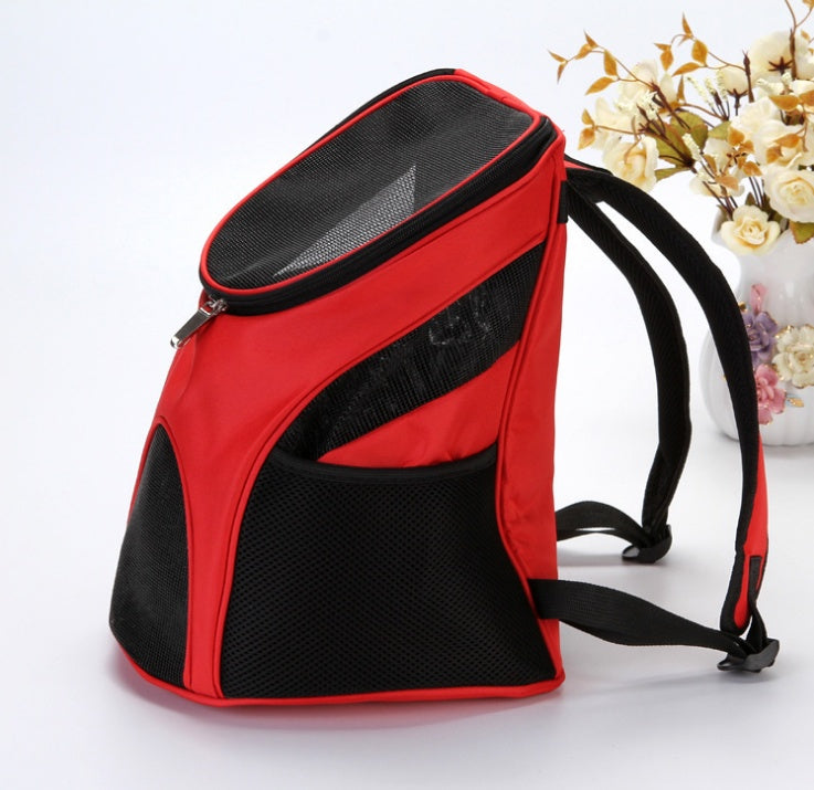 Red and black pet carrier backpack on a white background with flowers in the background