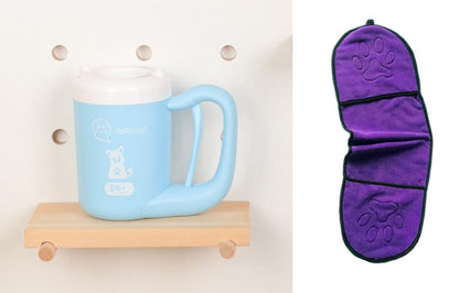 Blue mug on a wooden shelf with a purple paw-patterned product next to it.