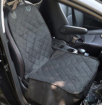 Gray car seat cover on a vehicle seat with interior details visible