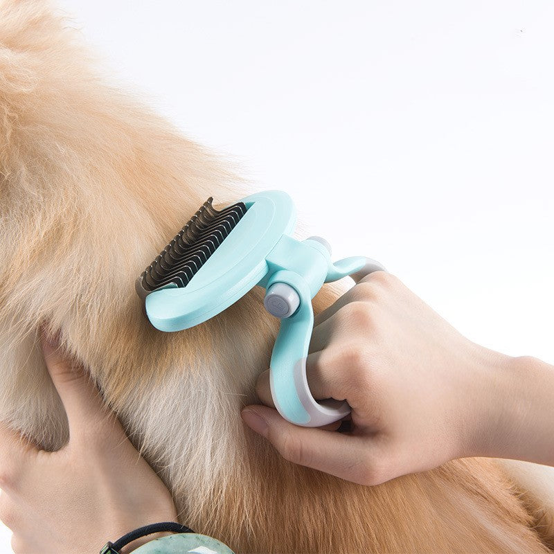 Pet grooming brush being used on a dog's fur with a white background