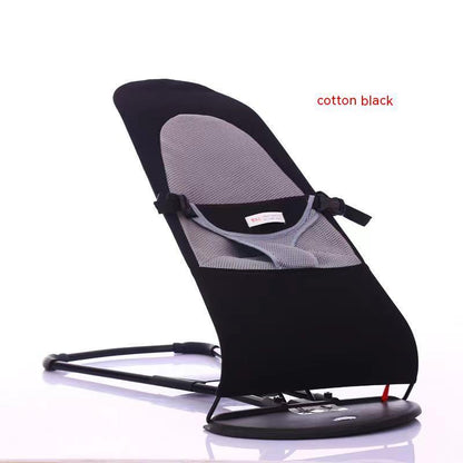 Black and gray baby bouncer with 'cotton black' text on a white background