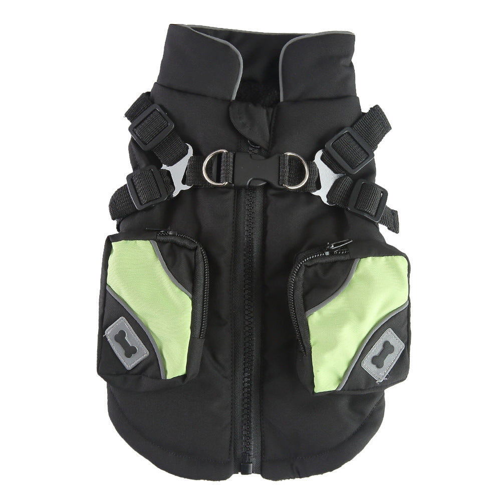 Black dog life jacket with green accents on a white background