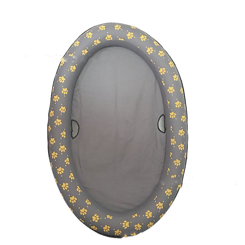 Gray pet bed with yellow paw prints on a white background