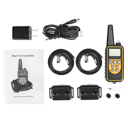 Dog training collar set with remote, receiver, cables, and accessories on a white background