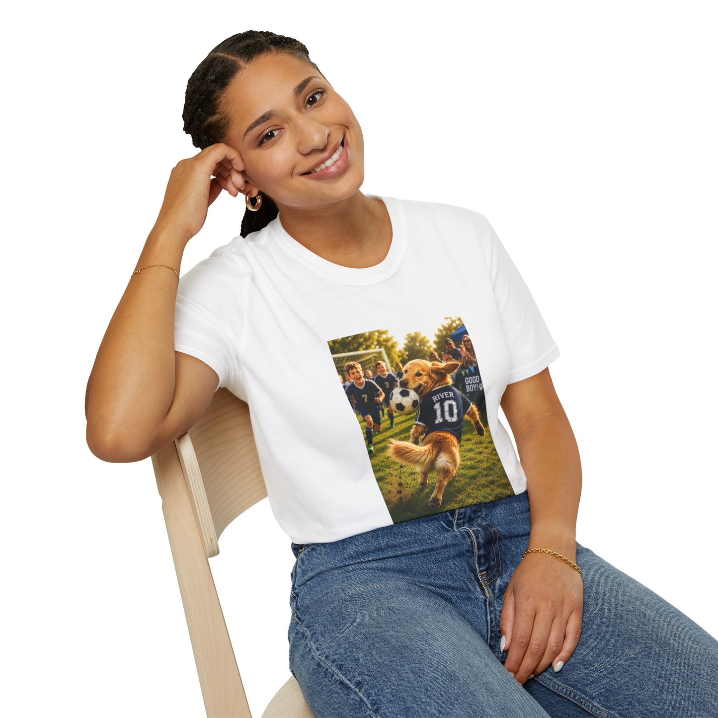 Woman wearing a white t-shirt with a colorful graphic design sitting on a chair.
