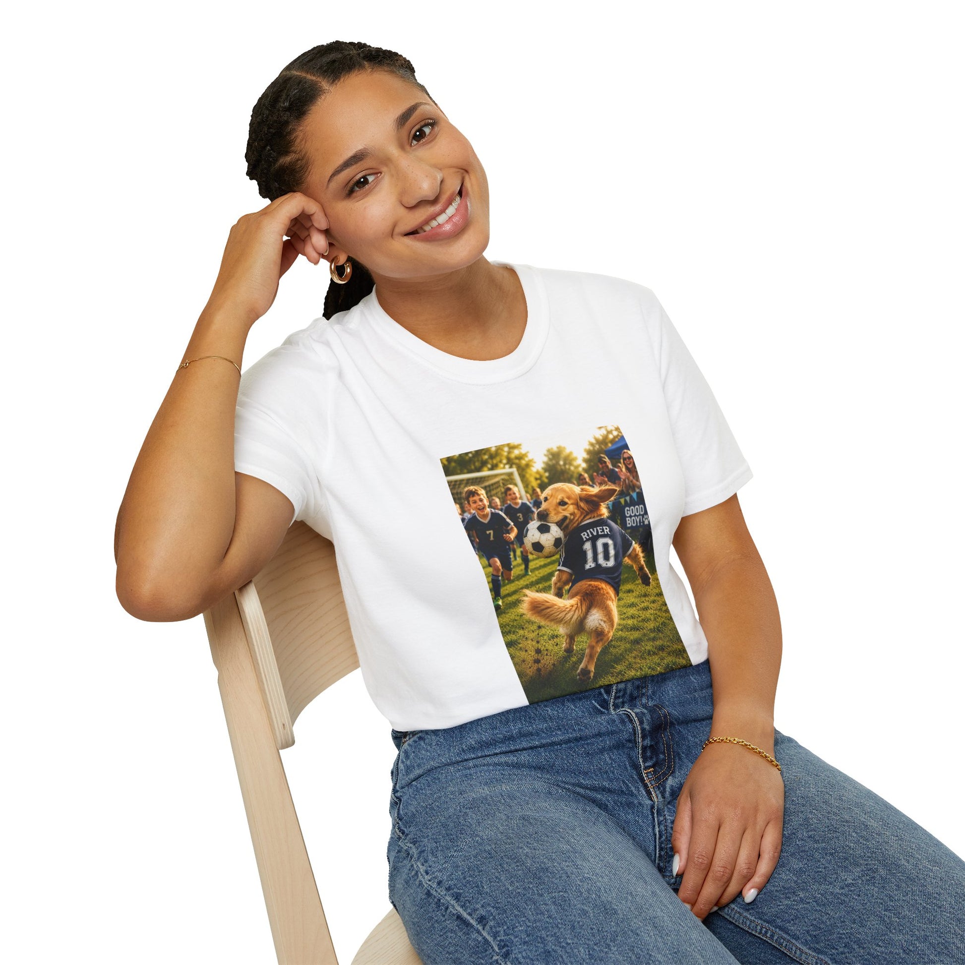 Woman wearing a white t-shirt with a colorful graphic design sitting on a chair.