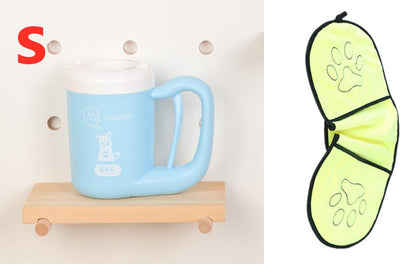 Blue mug on a wooden shelf with a green butterfly-shaped object on a white background
