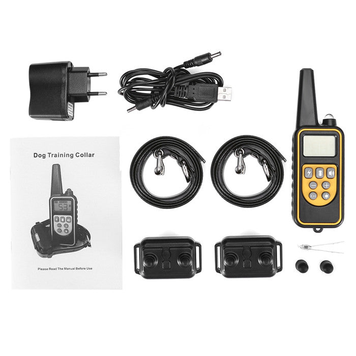 Dog training collar set with receiver, transmitter, charger, and cables on a white background