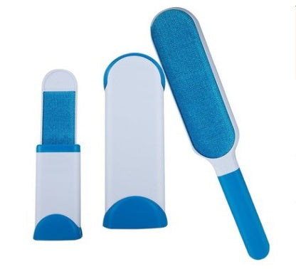 Set of three blue and white pet grooming tools on a white background