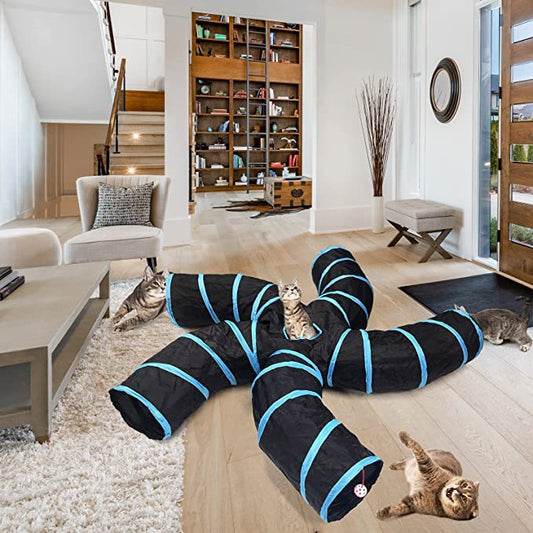 Black and blue cat tunnel toy on a wooden floor with cats interacting in a living room.