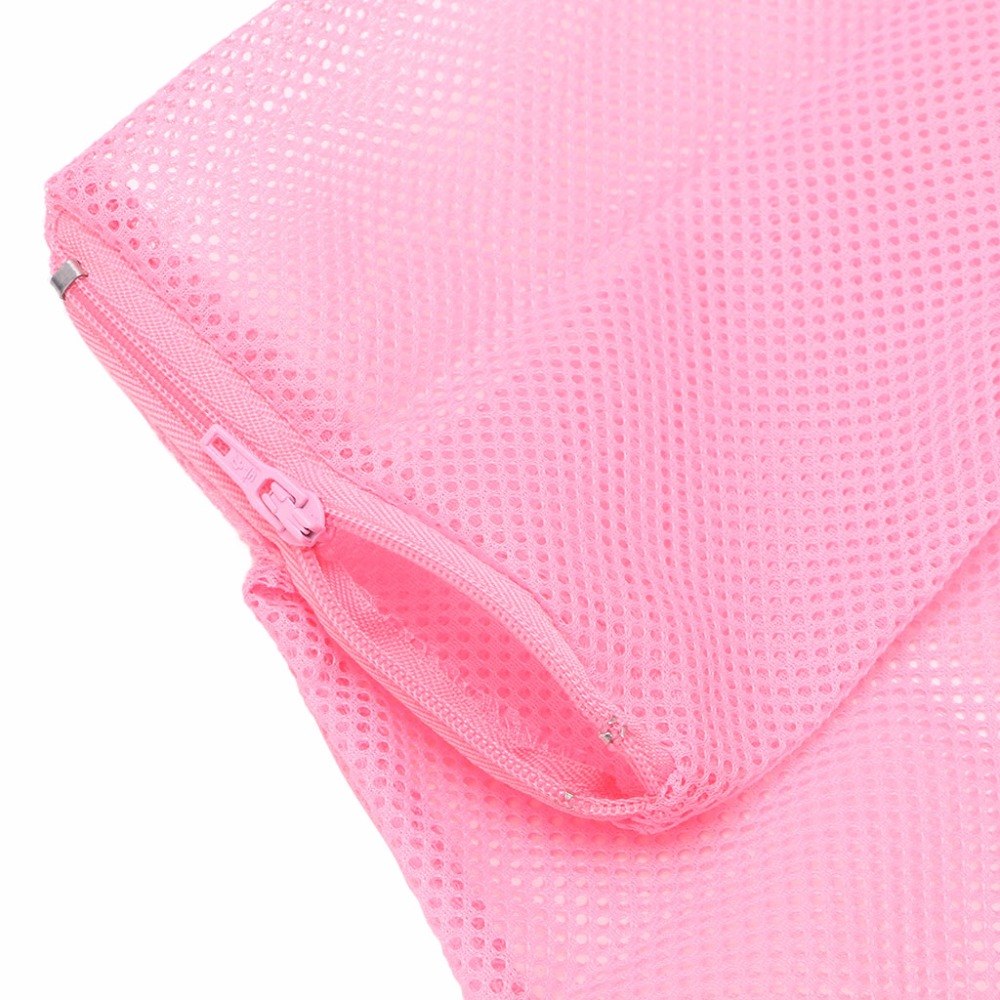 Close-up of a pink mesh bag with a zipper on a white background