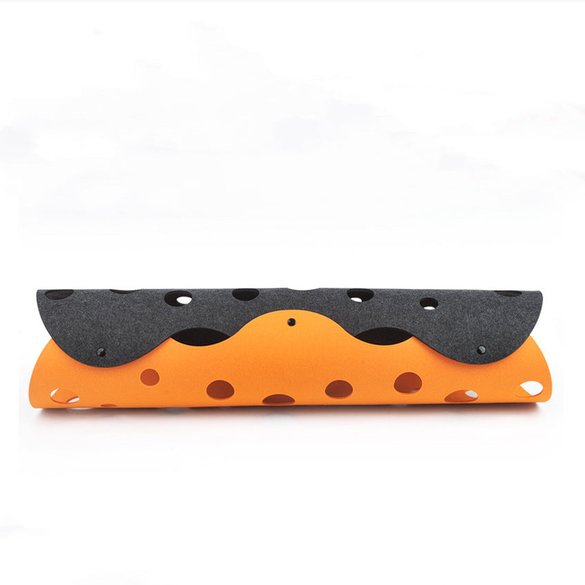 Orange and black wavy-patterned object on a white background