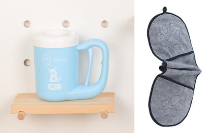 Blue mug on a wooden shelf with a gray bat-shaped eye mask on a white background