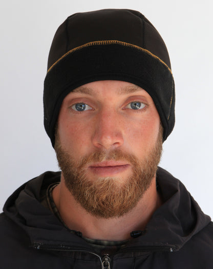Man wearing the camouflage Heat Factory men’s contour beanie, front view