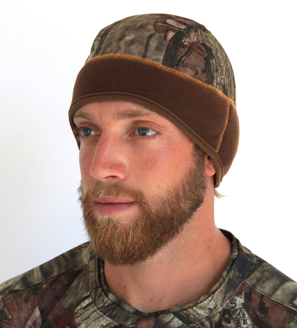 Side view of a man wearing the camouflage Heat Factory men’s contour beanie