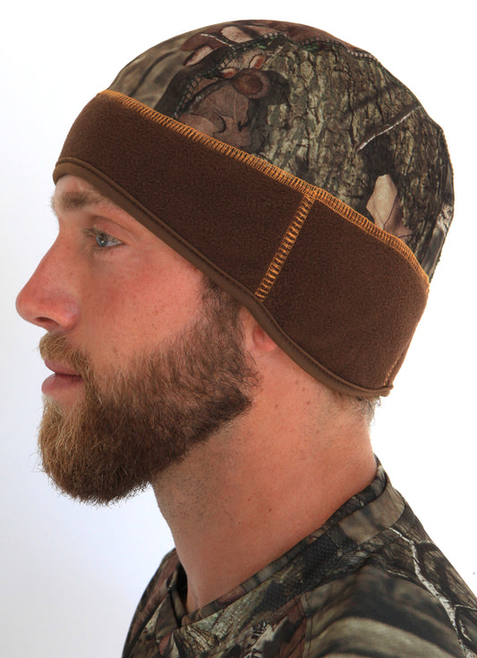 Side view of a man wearing the camouflage Heat Factory men’s contour beanie