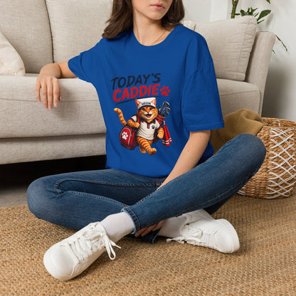 An royal blue short-sleeve crewneck t-shirt featuring a cartoon graphic of an orange tabby cat wearing a cap and holding golf clubs, with the text 'TODAY'S CADDIE' 