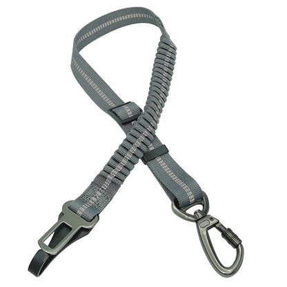 Gray safety harness with carabiner on a white background