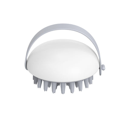 White scalp massager on a white background