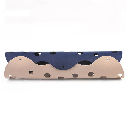 Wooden and blue ocarina on a white background