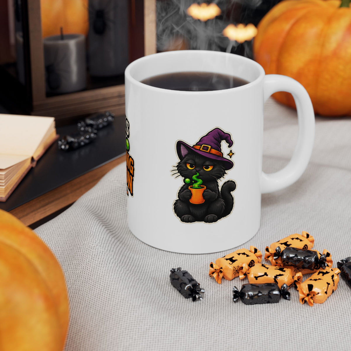 Black cat wearing a purple witch hat on white Halloween coffee mug