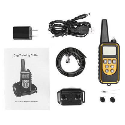 Dog training collar set with remote, receiver, power adapter, and cables on a white background