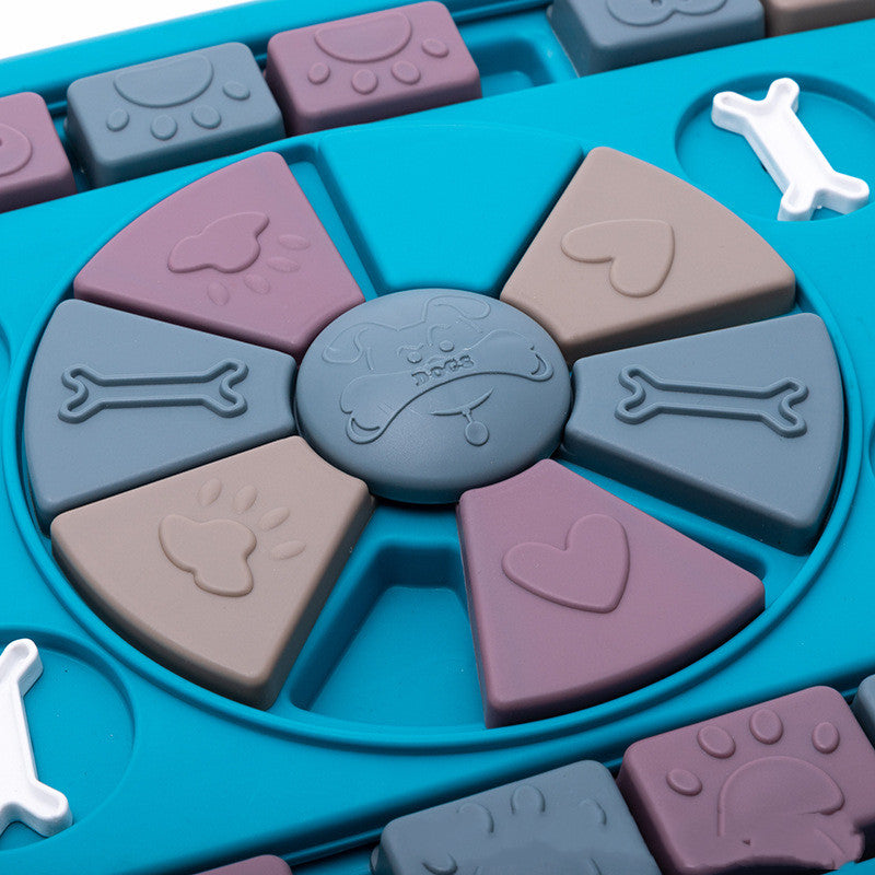 Colorful puzzle toy with animal-themed shapes on a blue base