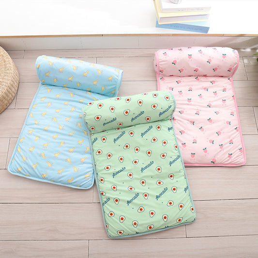 Three patterned sleeping mats on a wooden floor.