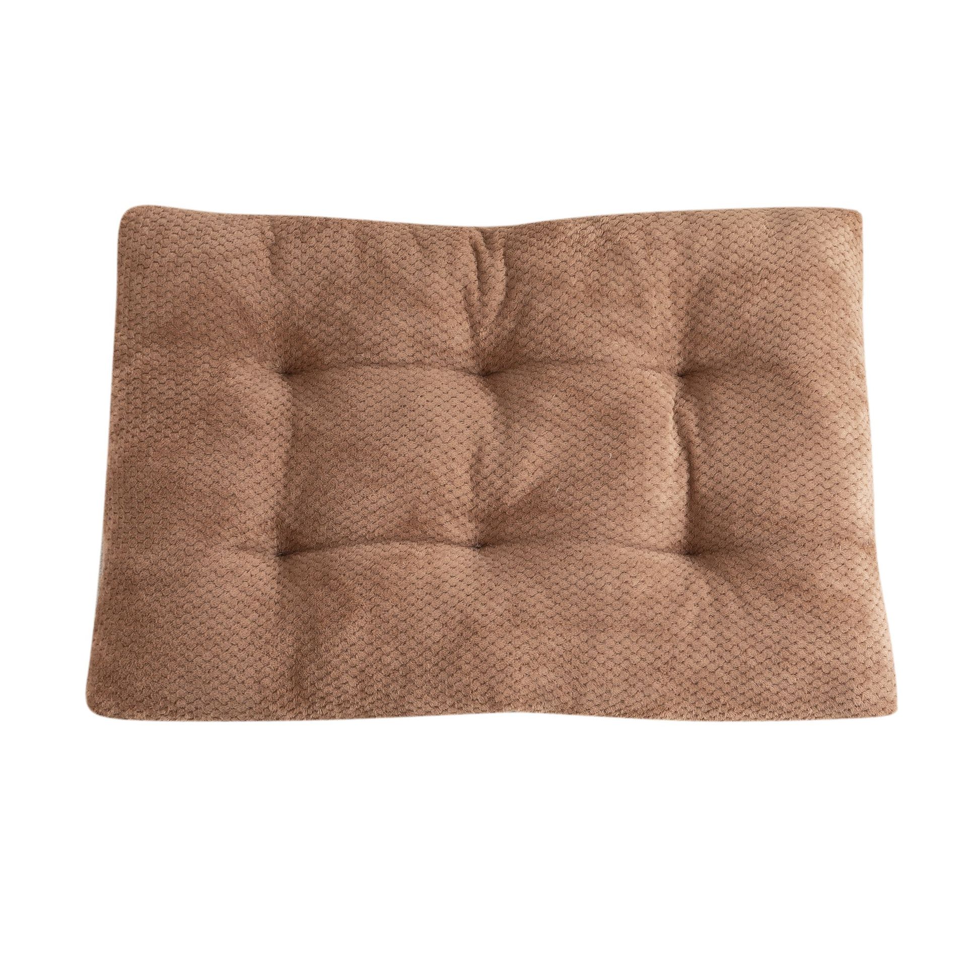 Brown textured cushion on a white background