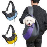 Person carrying a small dog in a pet carrier with three different color options displayed.