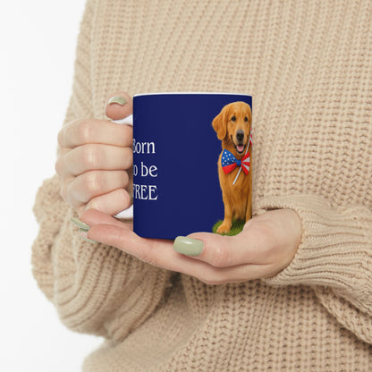 Person holding a mug with a dog design and text, wearing a beige sweater.