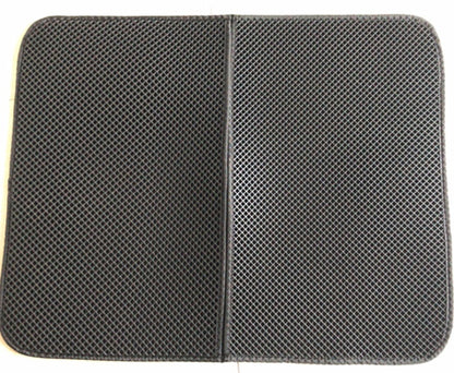 Black mesh pad with a white border on a white background
