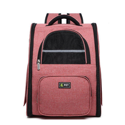 Pink pet carrier backpack with a visible brand logo on a white background