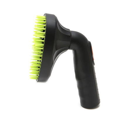 Black scrubber with green bristles on a white background