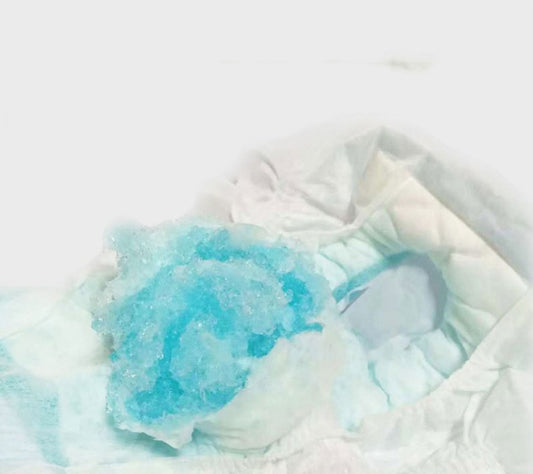 Close-up of a blue and white textured fabric on a light background