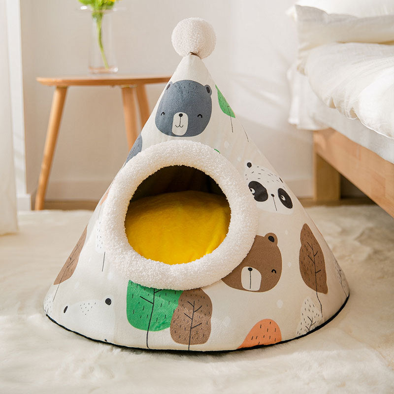 Pet bed with bear design on a light-colored surface