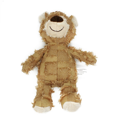 Brown teddy bear with a textured fabric on a white background