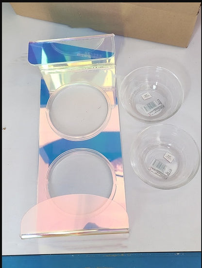 Clear plastic containers with lids on a white surface